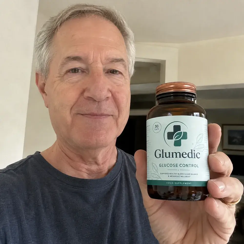 Adult holding a Glumedic supplement bottle